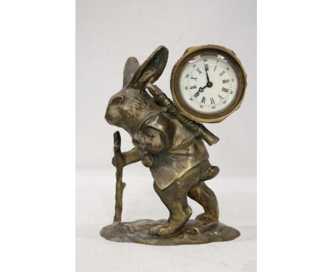 A VINTAGE BRASS MECHANICAL RABBIT CLOCK - VENDOR STATES WORKING ORDER, NO WARRANTY GIVEN, HEIGHT 18CM