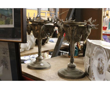 A PAIR OF VINTAGE INDIAN CHROME STAG HEAD CANDLESTICK HOLDERS (ONE A/F)