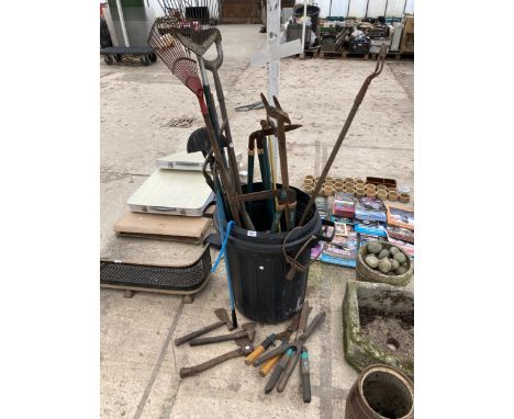 A BIN CONTAINING AN ASSORTMENT OF GARDEN TOOLS TO INCLUDE SHEARS, RAKES AND FORKS ETC