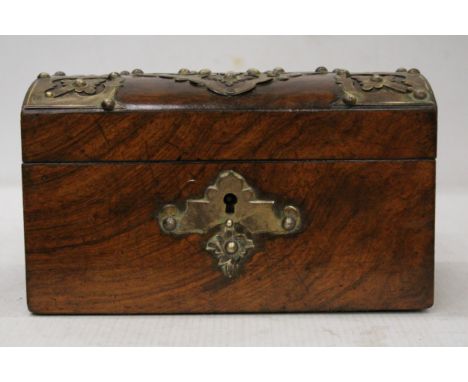 A WALNUT DOMED TOP TEA CADDY WITH BRASS DECORATION