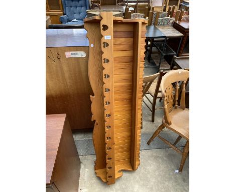 A PINE TWO TIER WALL SHELF WITH PIERCED HEART DECORATION, 55" WIDE