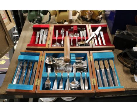 A PAIR OF VINTAGE WOODEN CASES CONTAINING A LARGE QUANTITY OF FLATWARE