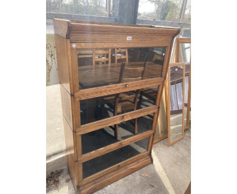 AN EARLY 20TH CENTURY OAK GLOBE WERNIKE STYLE TIER BOOKCASE