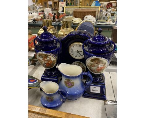 A VINTAGE EMPIRE WARE STYLE MANTLE CLOCK TOGETHER WITH EMPIRE WARE STYLE URNS IN COBALT BLUE WITYH GRECIAN SCENES TOGETHER WI