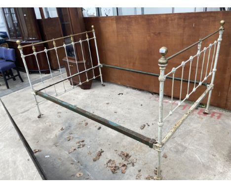 A VICTORIAN 4'6" BRASS AND IRON BEDSTEAD
