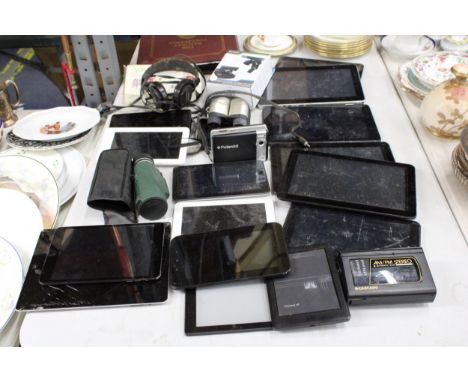 A QUANTITY OF TABLETS TO INCLUDE TWO I-PADS, E-READERS, POLAROID CAMERA, CASSETTE RECORDER, ETC