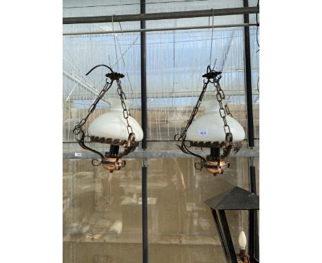 A PAIR OF DECORATIVE METAL CIELING LIGHT FITTINGS
