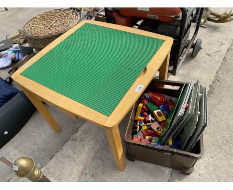 A LEGO TABLE AND AN ASSORTMENT OF LEGO