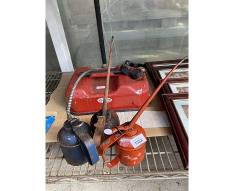 THREE VINTAGE PUMP ACTION OIL CANS AND A VALOR FUEL CAN