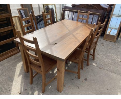 A PINE IKEA FORSBY DINING TABLE, 71" X 39.5" AND SIX LADDER BACK DINING CHAIRS