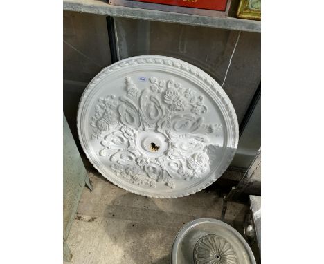 A VINTAGE WHITE PAINTED FOAM CEILING ROSE