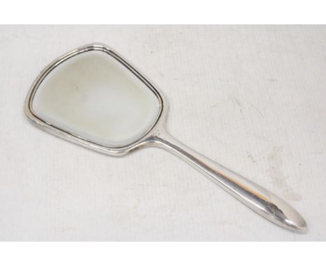 A HALLMARKED BIRMINGHAM SILVER VANITY MIRROR WITH ENGINE TURNED BACK