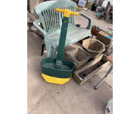 THREE CONCRETE GARDEN POTS, A PLASTIC BENCH AND A GARDEN SEEDER
