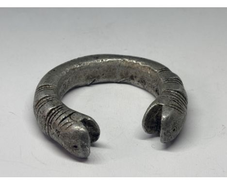 A WHITE METAL TOURQUE BANGLE