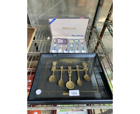 A FRAMED SET OF SEOUL OLYMPICS 1988 SPOONS AND A FURTHER CASED SET OF CERAMIC WELCOME TO SEOUL SPOONS