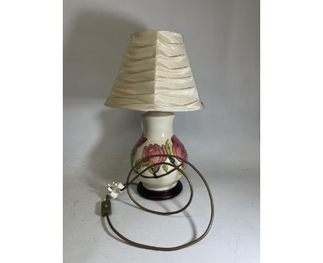 A LARGE MOORCROFT POTTERY LAMP BASE IN THE IN THE MAGNOLIA PATTERN WITH SHADE - BASE ONLY APPROX. 28 CM