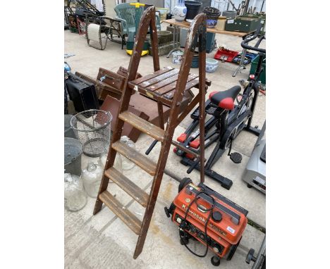 A VINTAGE TWYFORD FOUR RUNG WOODEN STEP LADDER