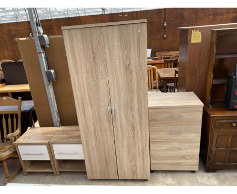 A WOOD EFFECT WARDROBE, CHEST OF FOUR DRAWERS AND A PAIR OF BEDSIDE CHESTS