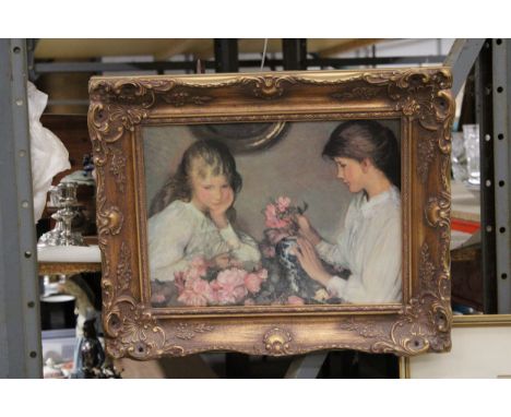 A PRINT OF TWO GIRLS WITH FLOWERS, IN AN ORNATE GILT FRAME, 44CM X 53CM