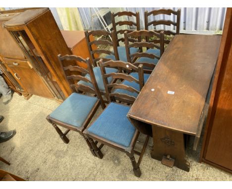 A MID 20TH CENTURY OAK DROP LEAF TABLE AND SIX LADDER BACK DINING CHAIRS