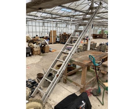 AN ALUMINIUM TWO SECTION 24 RUNG EXTENDING LADDER