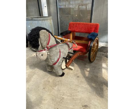 A VINTAGE CHILDS RIDE ALONG WOODEN PEDAL HORSE AND CART
