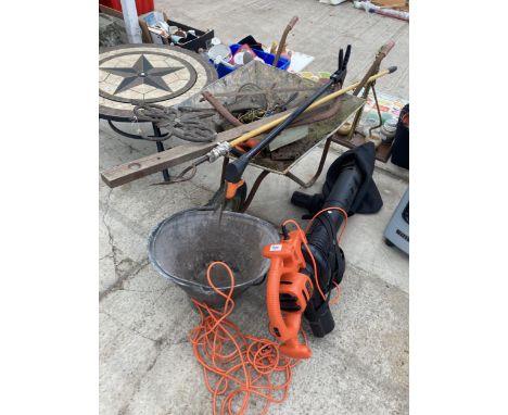AN ASSORTMENT OF ITEMS TO INCLUDE A GALVANISED COAL BUCKET, A BLACK AND DECKER ELECTRIC LEAF VAC AND A WHEEL BARROW WITH TOOL