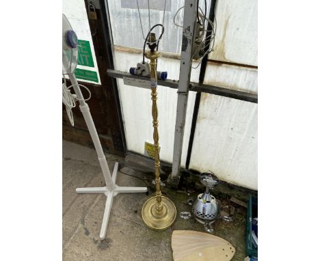 A DECORATIVE BRASS STANDARD LAMP