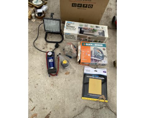 AN ASSORTMENT OF TOOLS TO INCLUDE A TILE CUTTER, BLACK AND DECKER JIGSAW AND A FOOT PUMP ETC