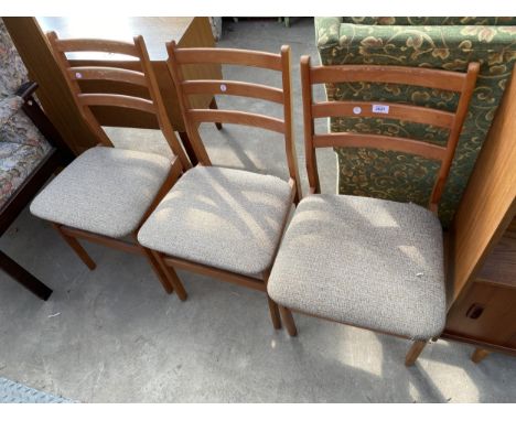 A SET OF THREE RETRO LADDER BACK DINING CHAIRS