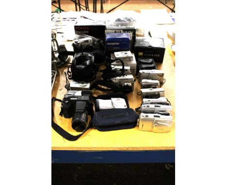 A COLLECTION OF CAMERAS TO INCLUDE 11 OLYMPUS, TWO PANASONIC PLUS CASES