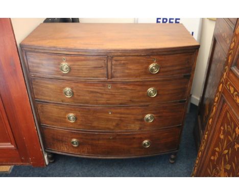 19th century mahogany bowfront chest of three long graduated drawers, raised on splayed bracket feet, 91.5cm wide. 