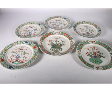 Set of 18th Century Chinese porcelain plates with green scroll border and flower panels, also two others, 20cm diameter (6) 