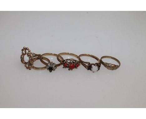 Six 9ct gold dress and other rings including a 9ct gold wedding band ring, a coral set dress ring, etc. 11.7g gross. (6) 