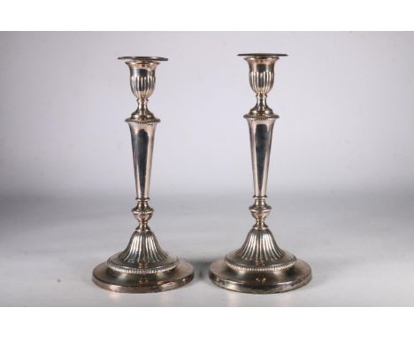 Pair of silver weighted candlesticks, hallmarks rubbed, possibly Sheffield, John Green, 30cm tall. Both candlestick hallmarks