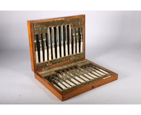 George V set of twelve fruit knives and forks with silver and mother of pearl handles, hallmarked Elkington and Co, Birmingha