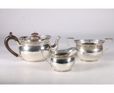 Edward VII silver bachelor tea service with foliate pierced rims and lion rampant to sides, hallmarked&nbsp;Charles Stuart Ha