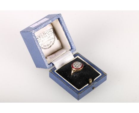 18ct gold art deco ring with nine round old cut diamonds and&nbsp;twenty square rubies in channel setting, size K, 3.2g. 