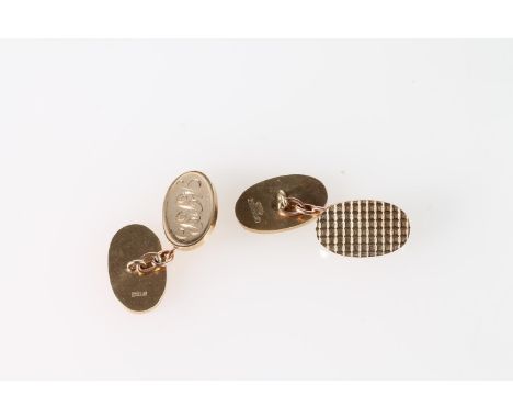 9ct gold pair of cufflinks,&nbsp; each with one engine turned panel and the other with initials ARB, 12.9g gross.&nbsp; 
