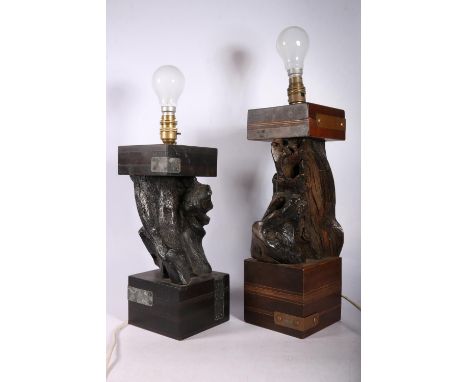 Two table lamps with stems formed of unworked wood and topped with block tops on&nbsp; block bases, 43cm to top of lamp holde