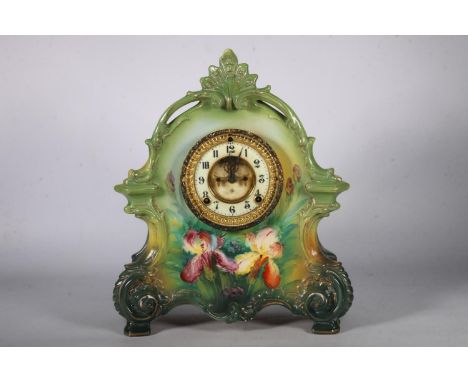 Royal Bonn ceramic mantel clock with Ansonia movement, twin train dial with arabic numerals, the ceramic case with allover fl