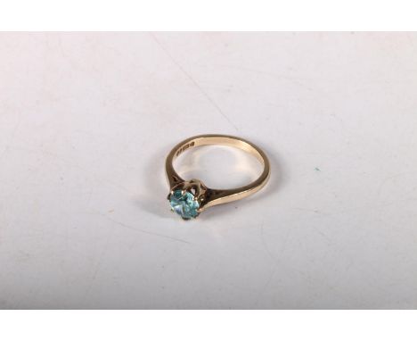 9ct gold ring with solitaire light blue zircon, approx. 1ct, size N, 2.6g.&nbsp; 