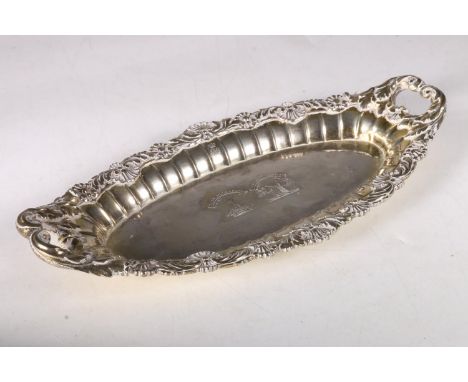 George III gilt silver oval dish with twin handles, chased cast scroll and shell border with two family crests to centre, Hal