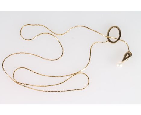 14ct yellow gold pendant set with large pearl on a flatlink chain, the oval frame section stamped '585', 10.3g gross. 