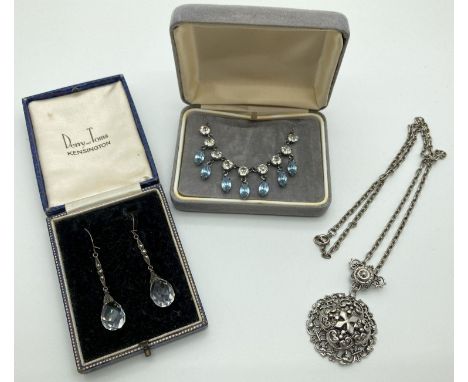 3 items of vintage costume jewellery. A clear &amp; blue stone set diamanté necklace, a pair of glass bead drop earrings with