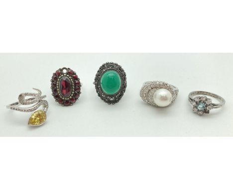 5 stone set silver dress rings in varying sizes and conditions. Two with a stone missing to each. To include garnet set, jade