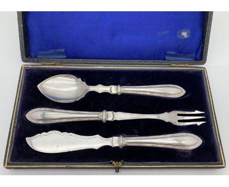 A cased silver plate condiment cutlery set. Comprising: jam spoon, pickle fork and cheese/fruit knife. All marked EPNS.  