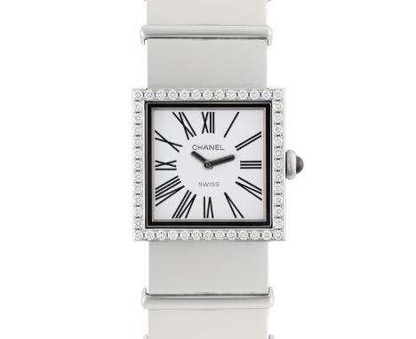 A LADY'S STAINLESS STEEL & DIAMOND CHANEL MATELASSE BRACELET WATCH CIRCA 2000sMovement: Quartz.Case: Width approx. 22mm, fact