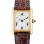 A LADY'S SOLID SILVER GILT MUST DE CARTIER PARIS TANK WRIST WATCH CIRCA 1990, REF. 2415 Movement: