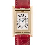 A RARE GENTLEMAN'S MID SIZE 18K SOLID GOLD & DIAMOND CARTIER TANK BASCULANTE WRIST WATCH CIRCA